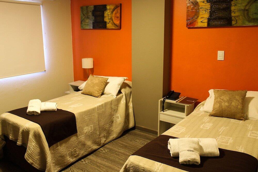 Foto de una habitación de Savannah Cordoba Hotel