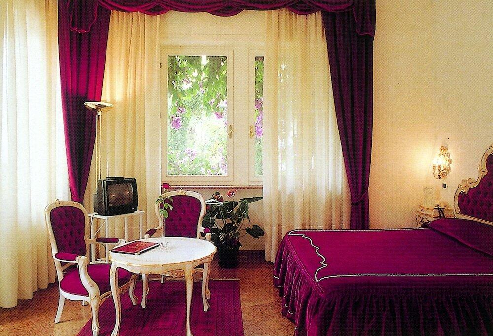 Foto de una habitación de Park Hotel Ville Montefiori