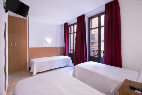 Foto de una habitación de Hostal Atenas Granada