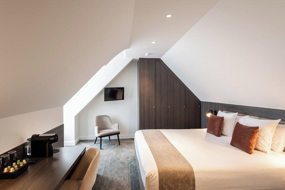 Foto de una habitación de Hotel Academie