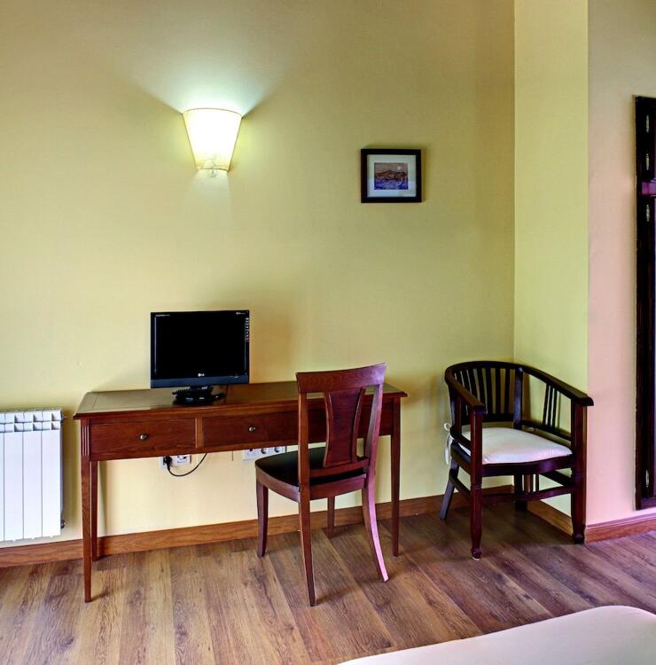 Foto de una habitación de Coviella Hotel Rural