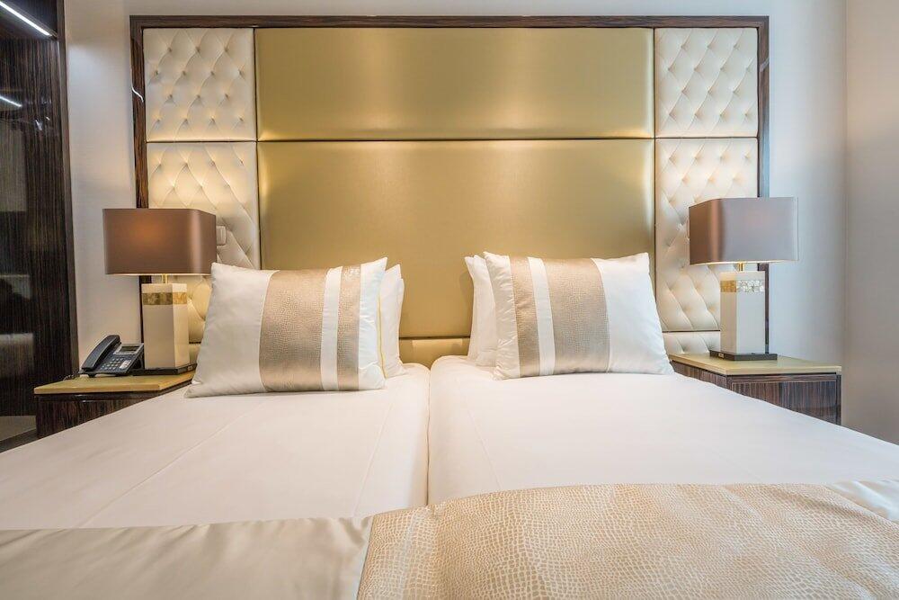 Foto de una habitación de MeraPrime Gold Design Hotel