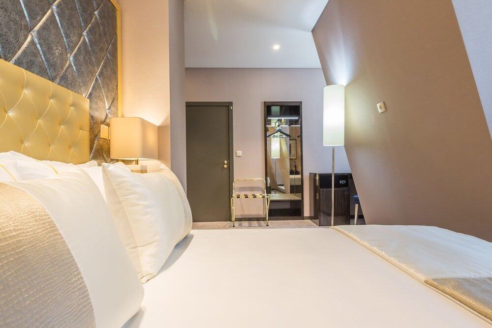 Foto de una habitación de MeraPrime Gold Design Hotel