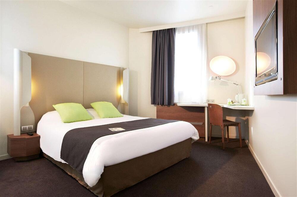 Foto de una habitación de Hotel Campanile Nice Aéroport
