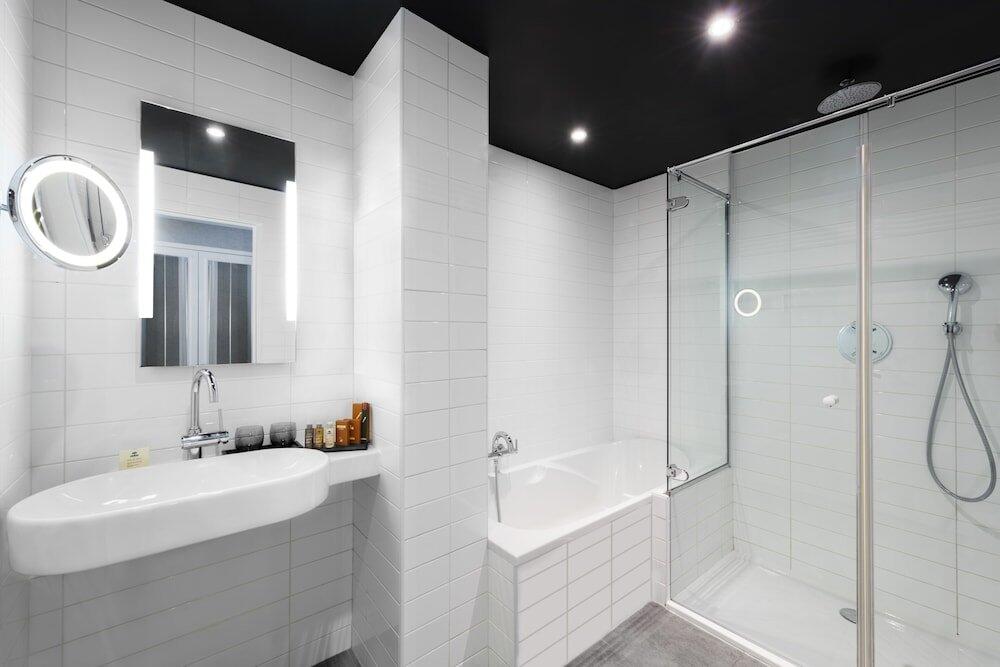 Foto del baño de Hotel Louvre Saint-Honoré