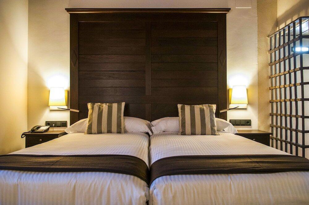 Foto de una habitación de Hotel Convento Aracena &amp;amp; SPA