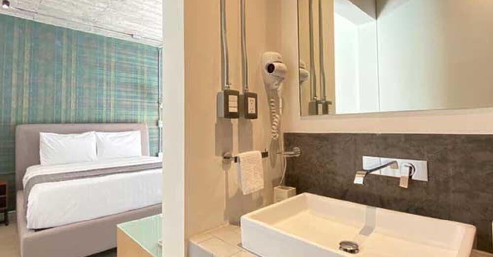 Foto de una habitación de Hotel The Host Business Suites at WTC