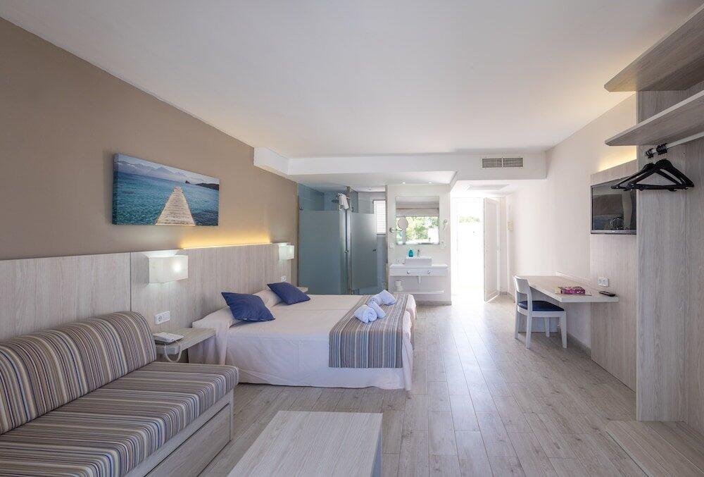 Foto de una habitación de Hotel Club Es Talaial