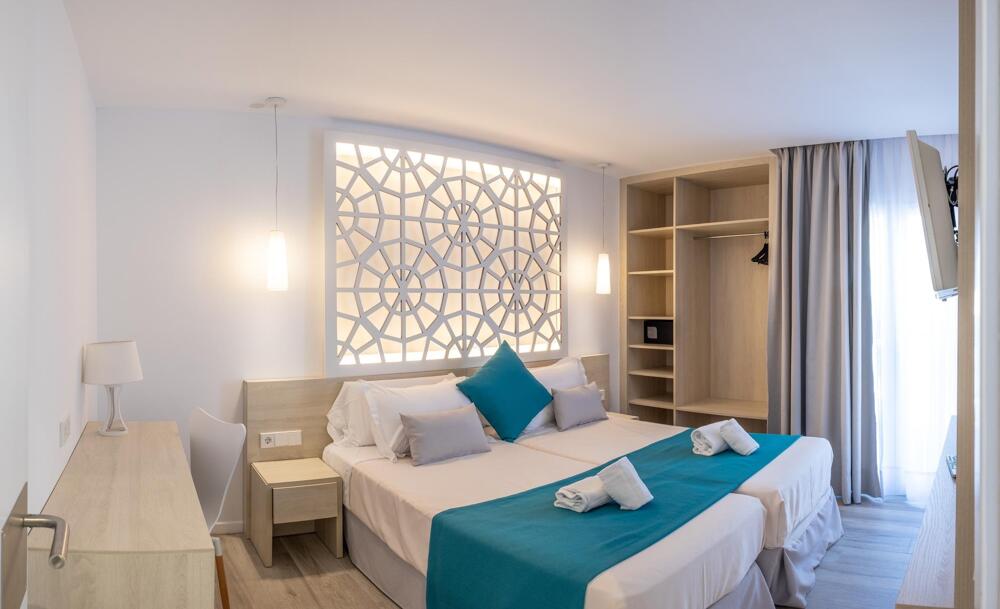 Foto de una habitación de Hotel Club Es Talaial