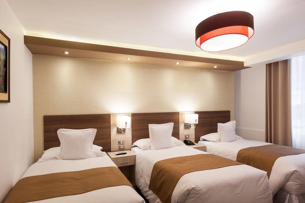Foto de una habitación de Inti Punku MachuPicchu Hotel &amp;amp; Suites