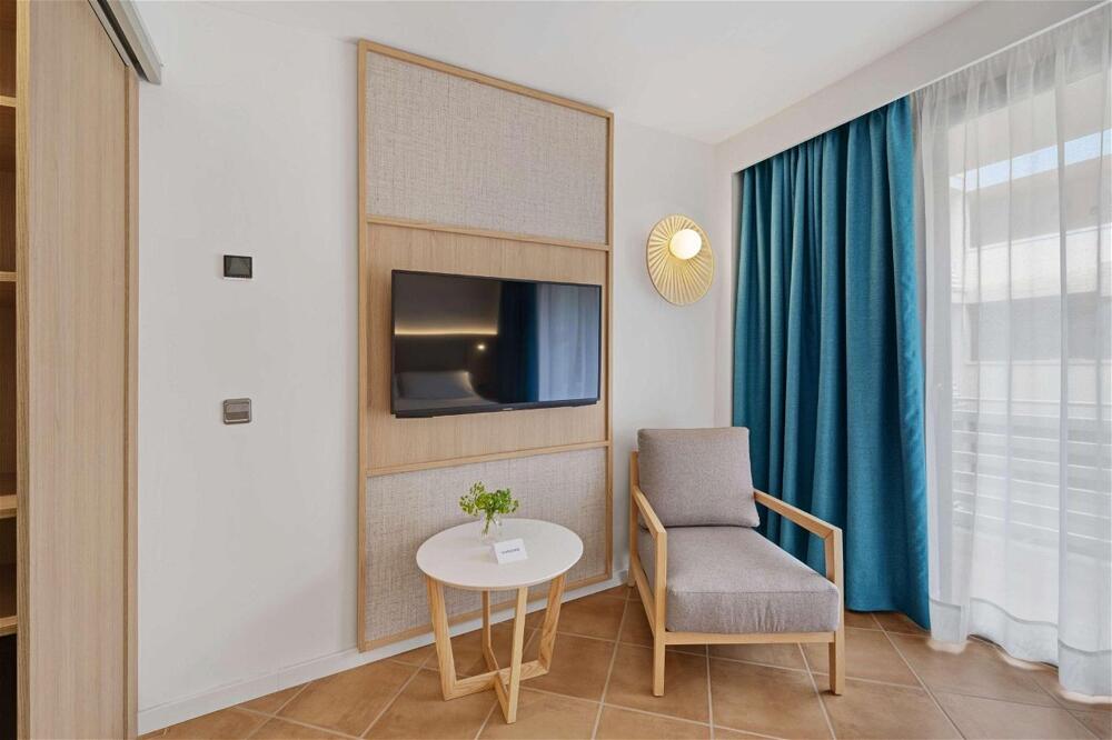 Foto de una habitación de Hotel Occidental Cala Viñas