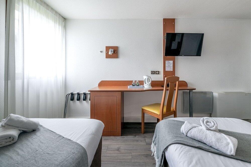 Foto de una habitación de Hotel Les Dépendances Du Cyrano