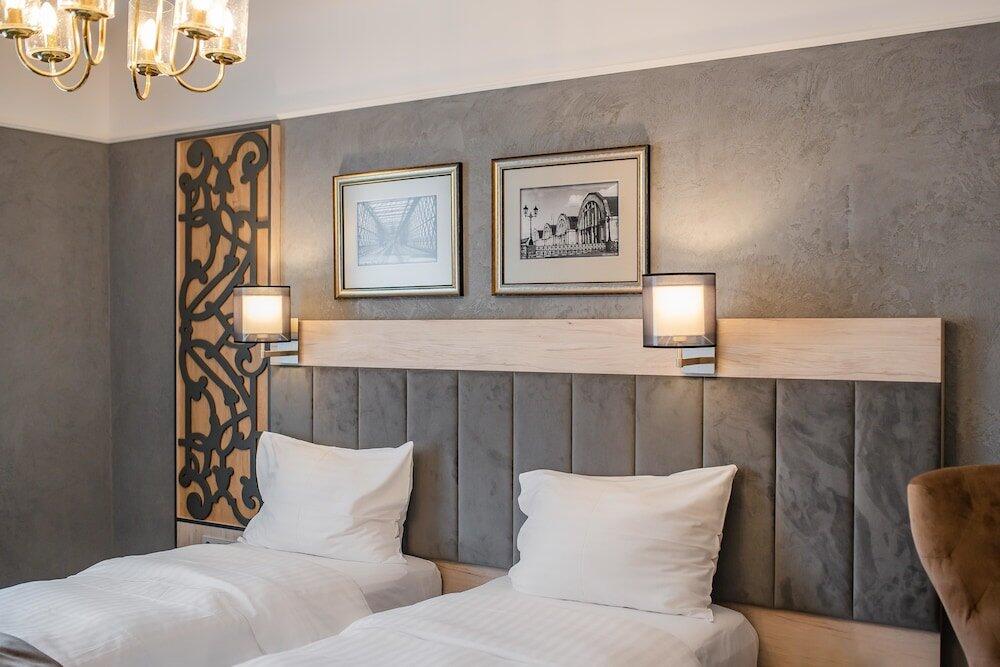 Foto de una habitación de Metropole Hotel by Semarah