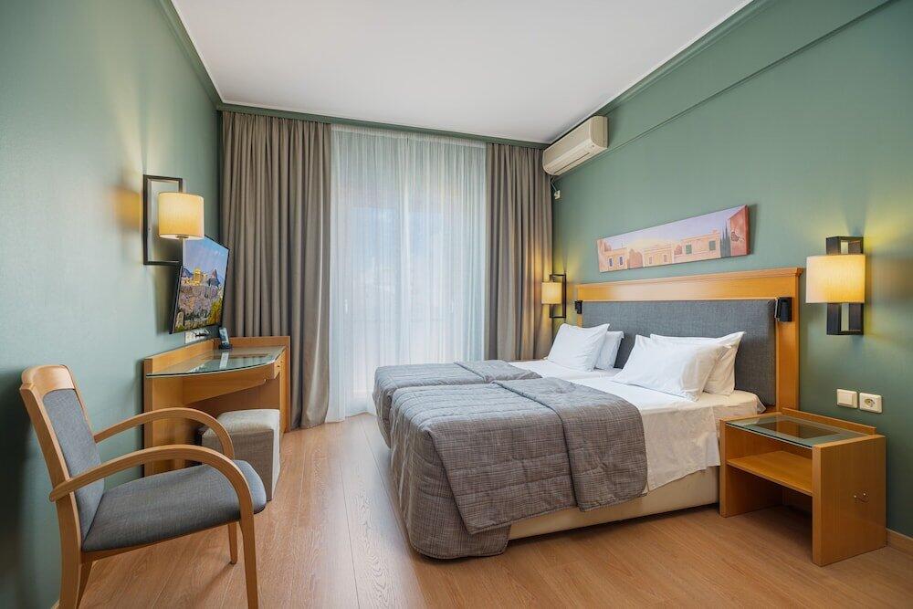 Foto de una habitación de Plaka Hotel