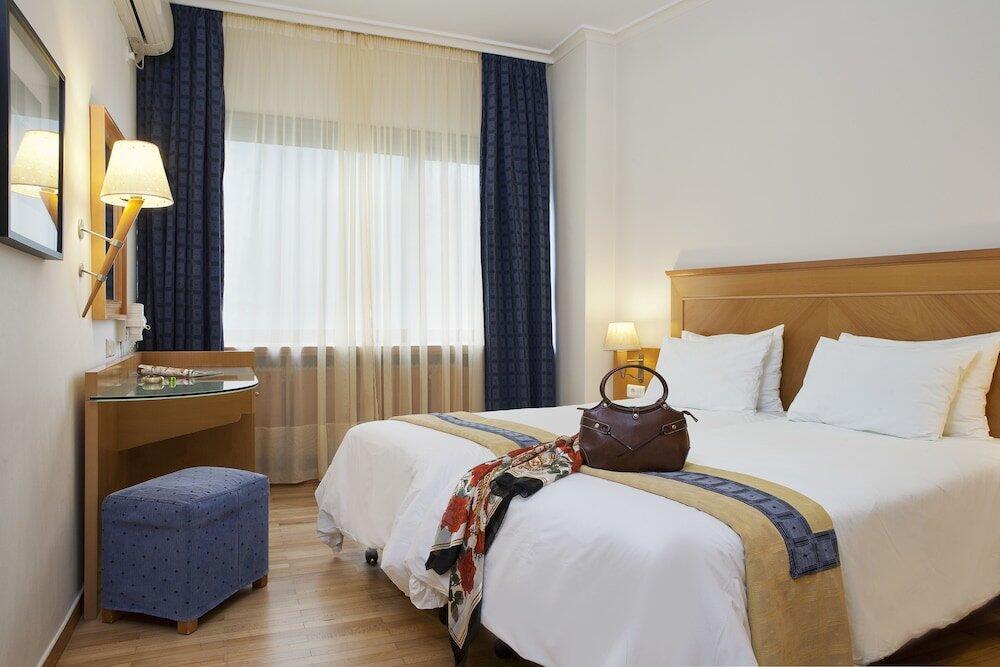 Foto de una habitación de Plaka Hotel