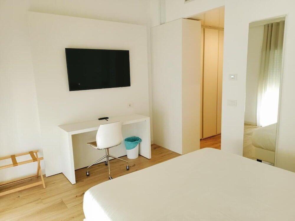 Foto de una habitación de Hotel Toscana Charme Resort