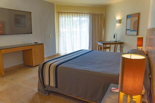 Foto de una habitación de Hotel Friendly Fun Vallarta Different Experiences