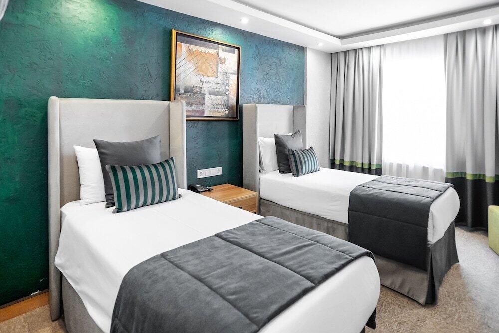 Foto de una habitación de Carlton Hotel Old City