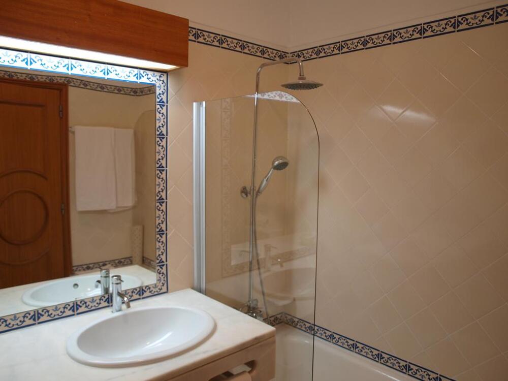 Foto del baño de Aparthotel Luna Clube Oceano