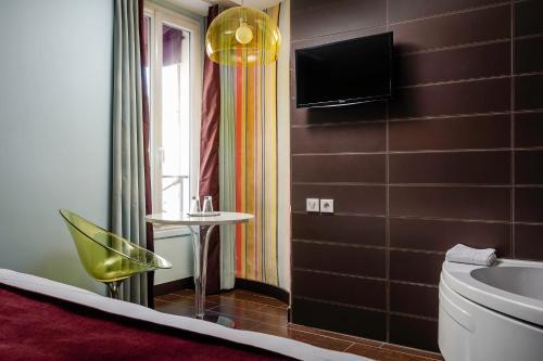 Foto de una habitación de Hotel Courcelles Etoile