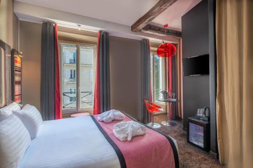 Foto de una habitación de Hotel Courcelles Etoile