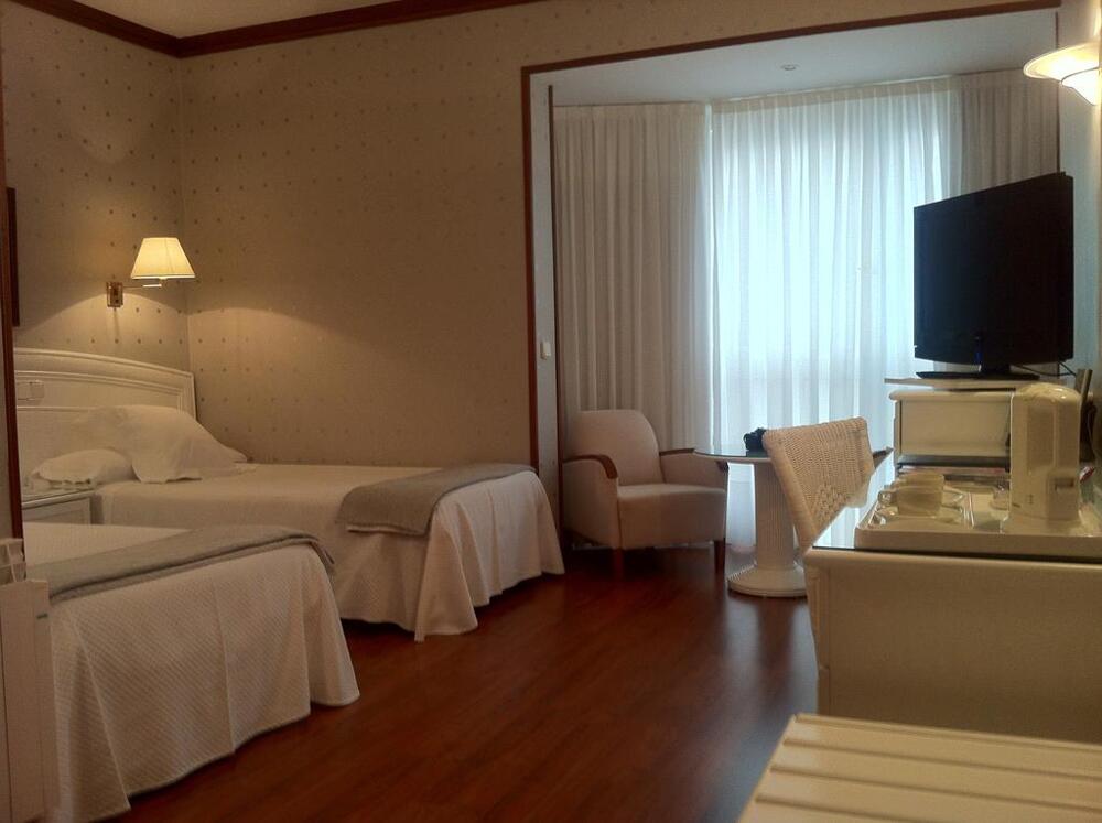 Foto de una habitación de Las Rocas Playa Hotel