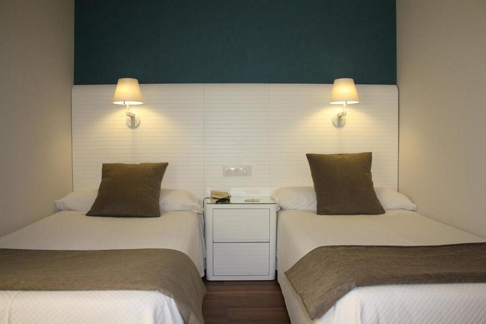 Foto de una habitación de Las Rocas Playa Hotel