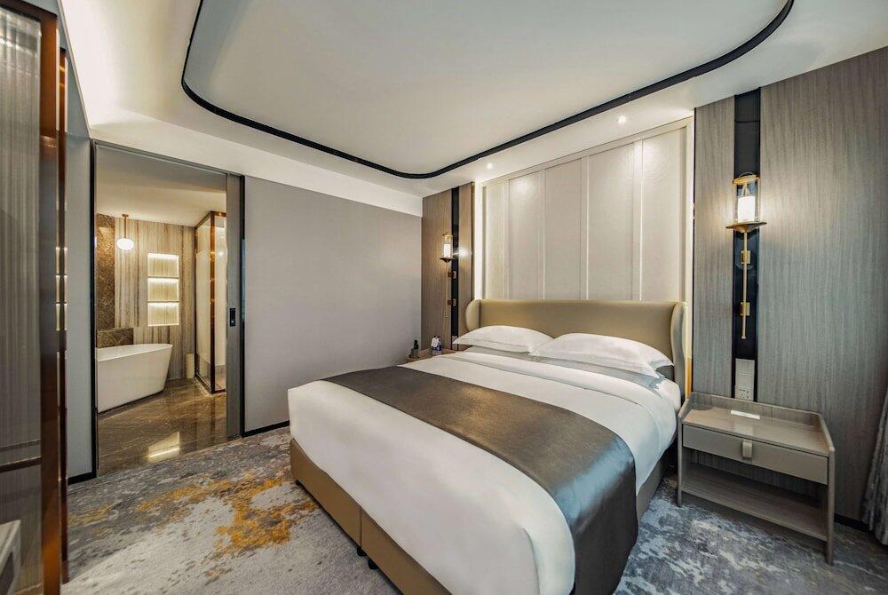 Foto de una habitación de Howard Johnson Paragon Hotel Beijing