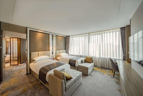 Foto de una habitación de Howard Johnson Paragon Hotel Beijing