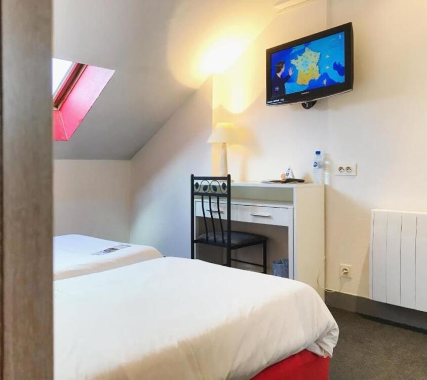 Foto de una habitación de Brit Hotel Aux Sacres Reims Centre