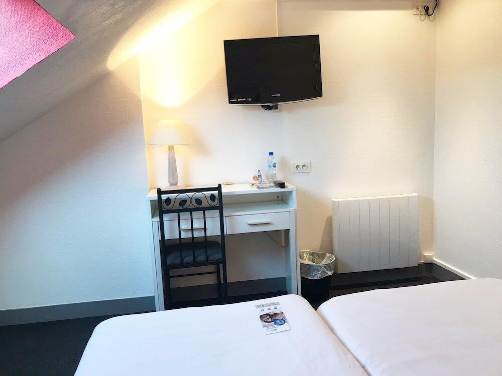Foto de una habitación de Brit Hotel Aux Sacres Reims Centre