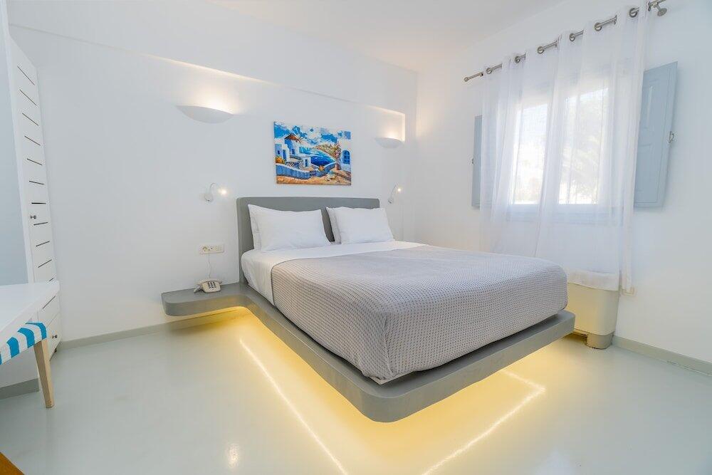 Foto de una habitación de Hotel Central Fira Suites