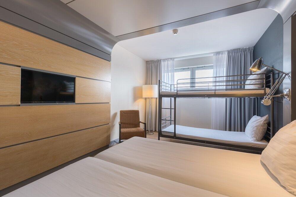 Foto de una habitación de Leonardo Hotel Almere City Center