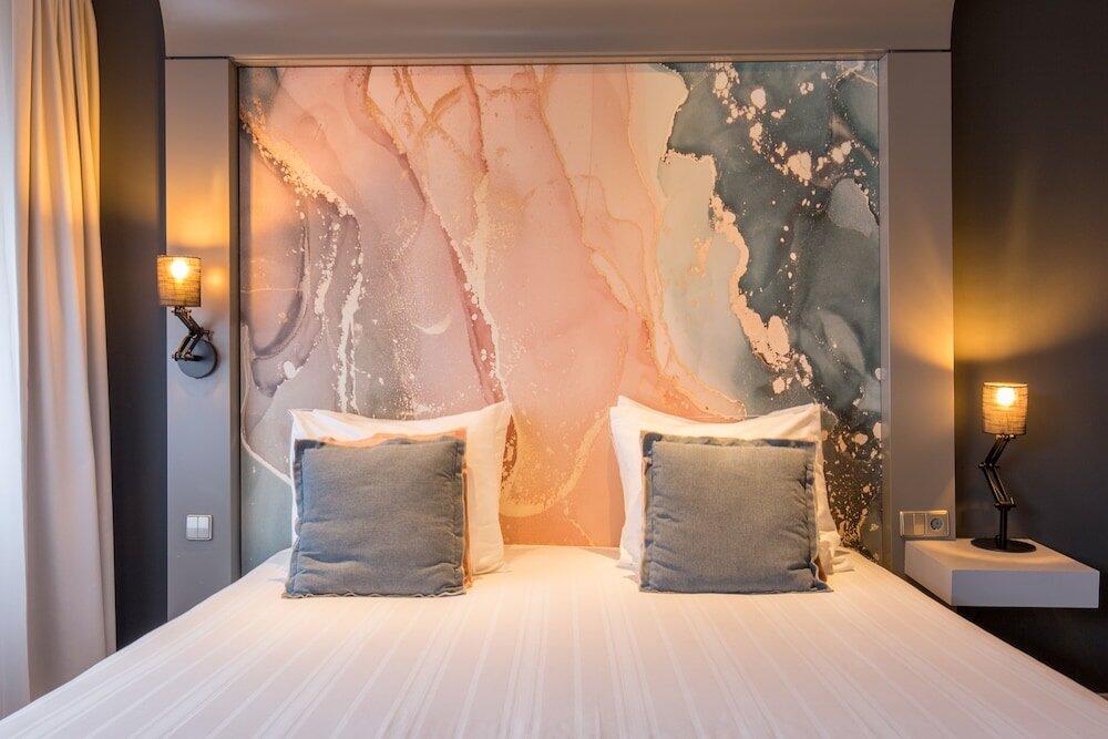 Foto de una habitación de Leonardo Hotel Almere City Center
