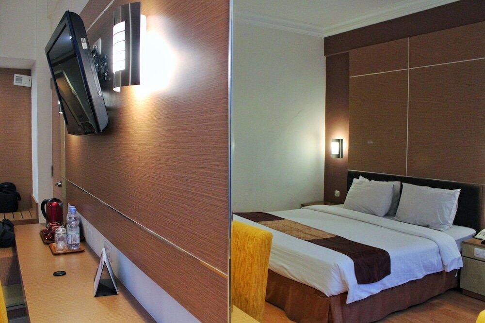 Foto de una habitación de Hotel Grand Inna Tunjungan