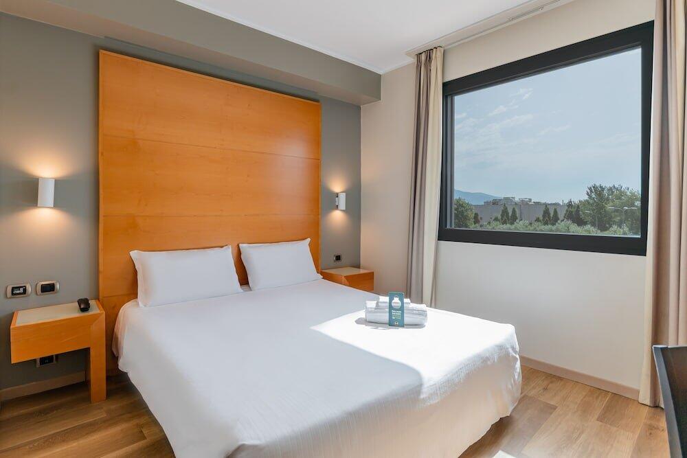 Foto de una habitación de B&amp;amp;B Hotel Pisa