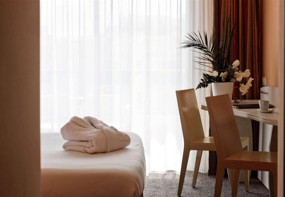 Foto de una habitación de Hotel Best Western Astoria