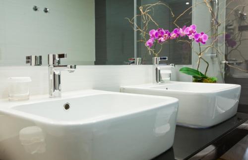 Foto del baño de Hotel Atrium