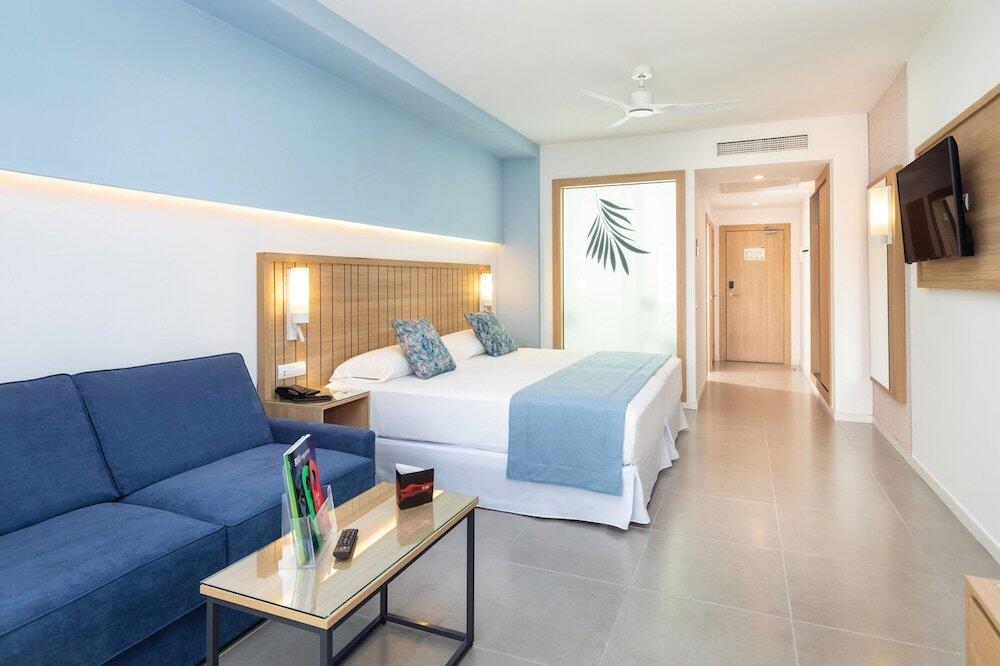 Foto de una habitación de Hotel Riu Palace Palmeras - All Inclusive