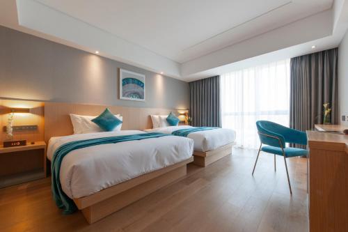 Foto de una habitación de Radisson Blu Hotel Shanghai Hong Quan