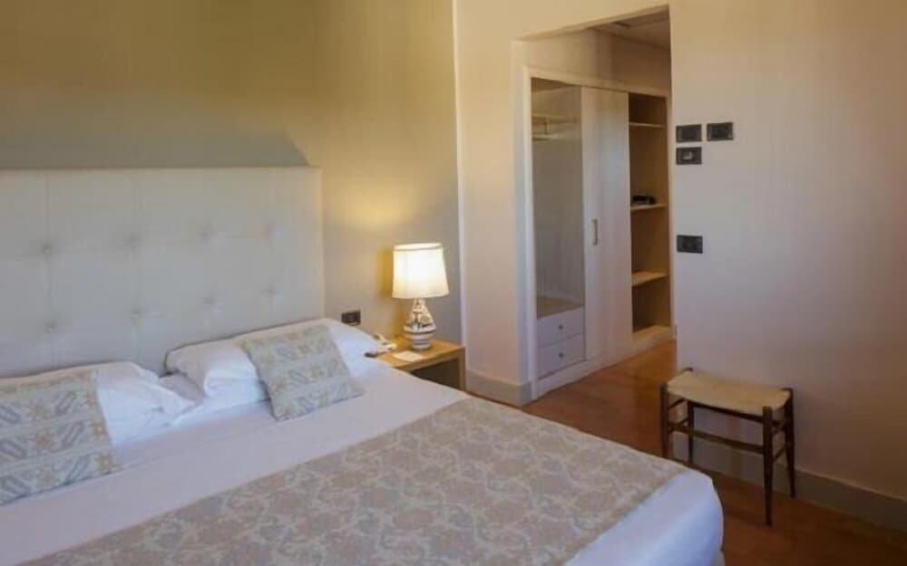 Foto de una habitación de Hotel Dei Duchi
