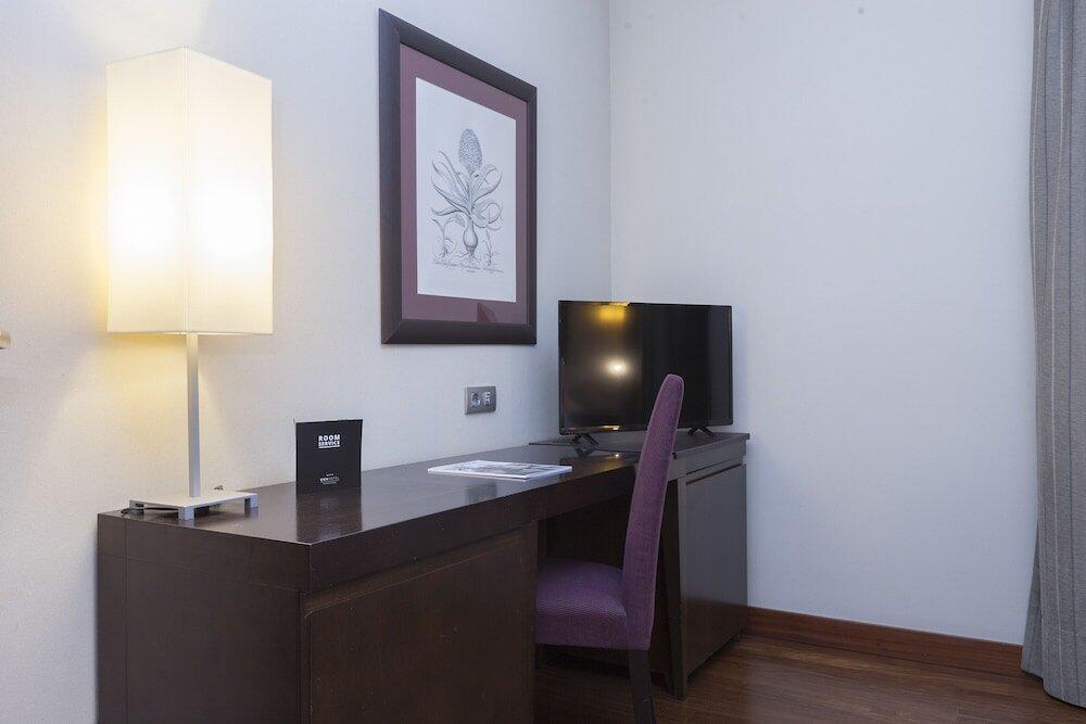 Foto de una habitación de Hotel URH Palacio de Oriol