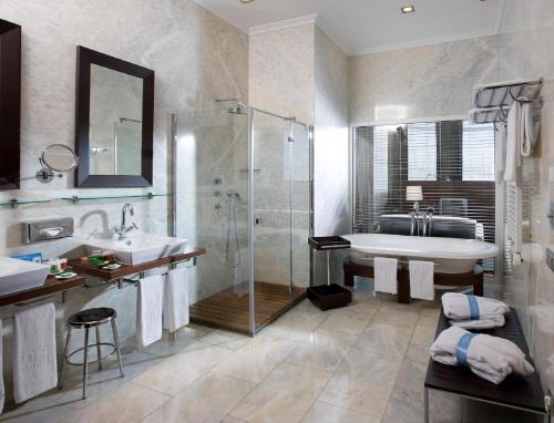 Foto del baño de Hotel URH Palacio de Oriol