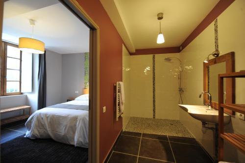 Foto del baño de Hôtel Château De Palaja