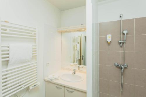 Foto del baño de Aparthotel Mer &amp;amp; Golf City Perpignan Centre