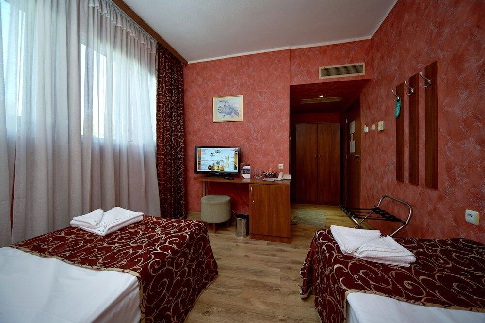 Foto de una habitación de Hotel Akord