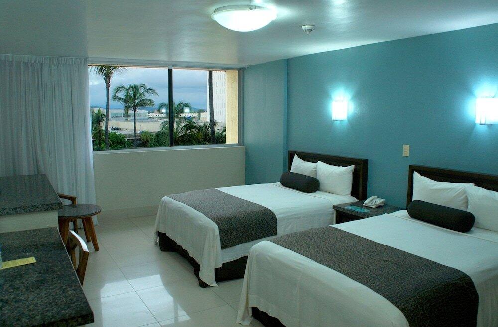 Foto de una habitación de Hotel Don Pelayo Pacific Beach