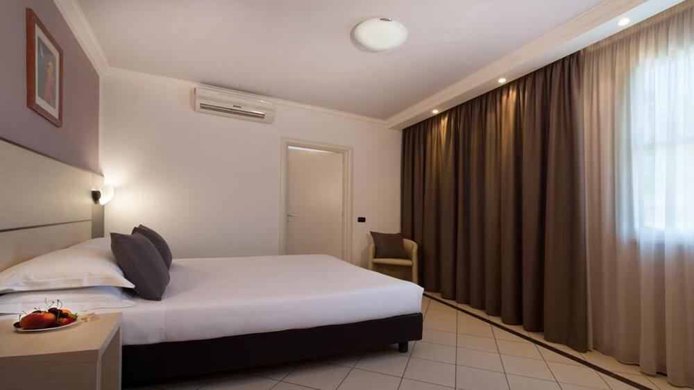 Foto de una habitación de CDH Hotel La Spezia