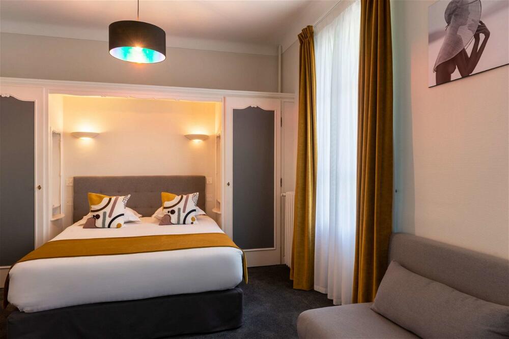 Foto de una habitación de The Originals Boutique, Hôtel Les Nations, Vichy