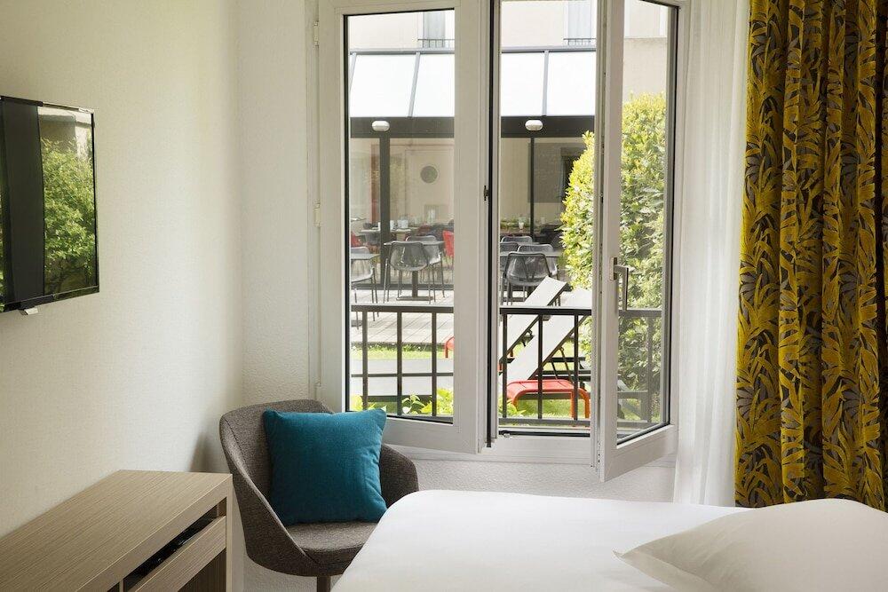 Foto de una habitación de Hotel Escale Oceania Saint Malo